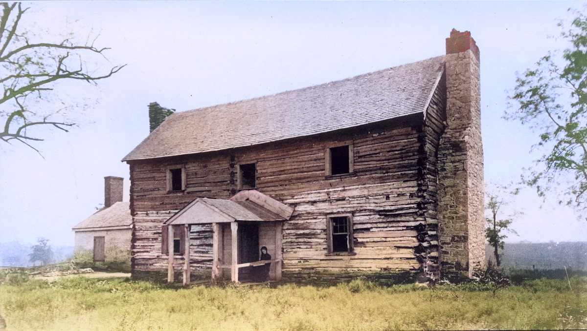 Photograph of an old two-story house