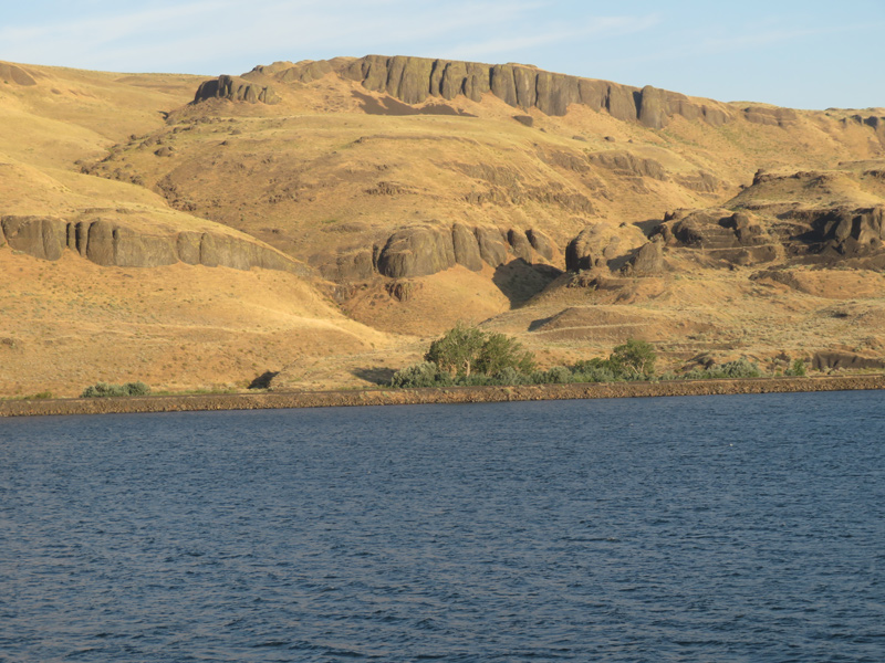Small flats between the Columbia River and high barren hills